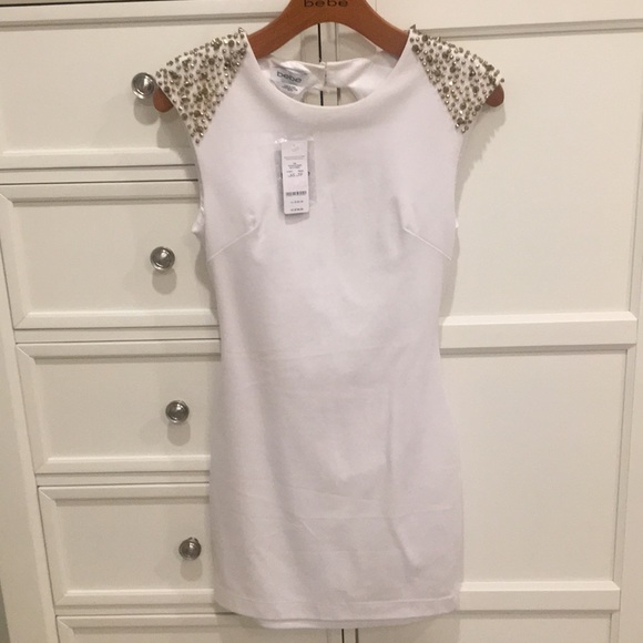 bebe Dresses & Skirts - White with gold detail Bebe dress size XS